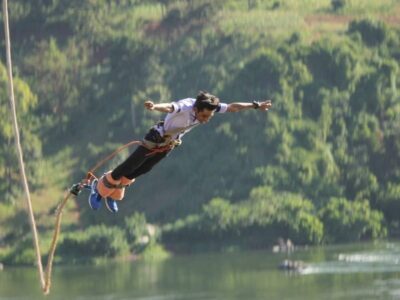 A photograph of a tourist taken during a bungee jumping tour in Jinja in Eastern Uganda.