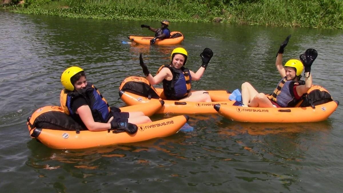 A photograph of tourists river bugging taken during a river bugging tour in Jinja in Eastern Uganda.