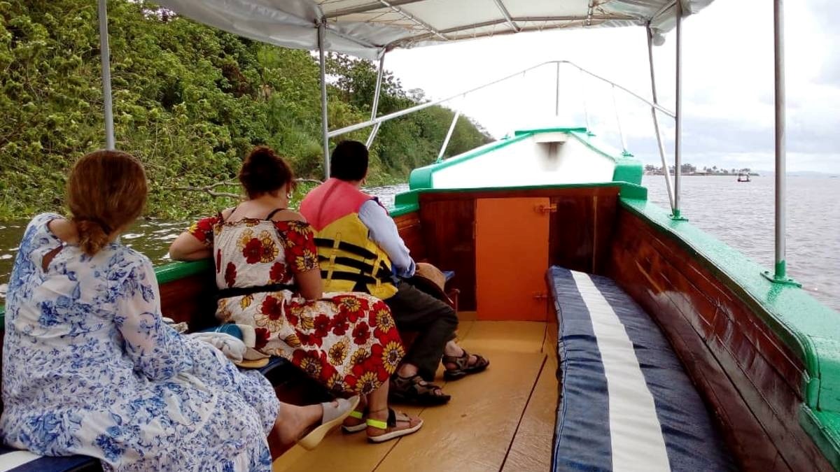 A photograph of tourists taken during the Source of the Nile Cruise in Jinja, Eastern Uganda.