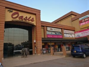 A photograph of Oasis Mall in Kampala, Uganda