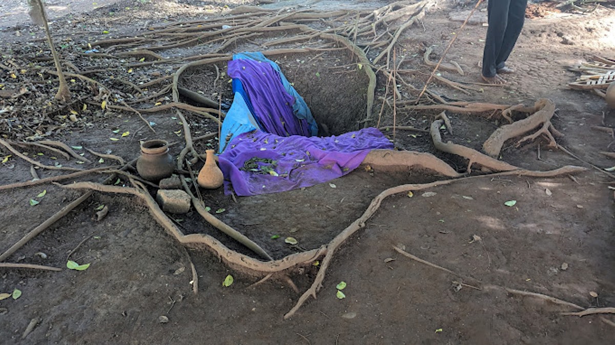 A photograph of one of the pits at Tanda Archeological pits in Uganda