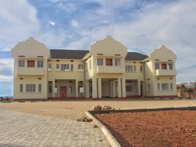 A photograph of the Ankole Kingdom Palace located in South - Western Uganda.