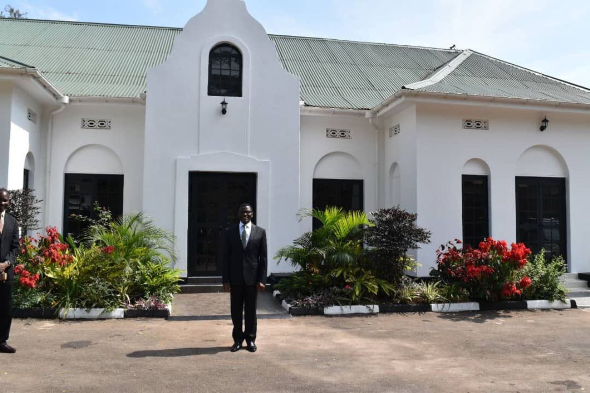 A photograph of the Katikkiro of Buganda infront of the Butikkiro in Mengo in Kampala, Uganda