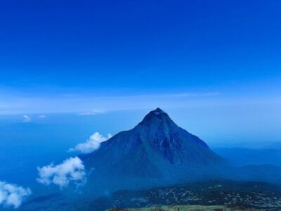 Photograph of a dormant volcanic mountain taken during a hiking tour in Volcanoes National Park in Rwanda