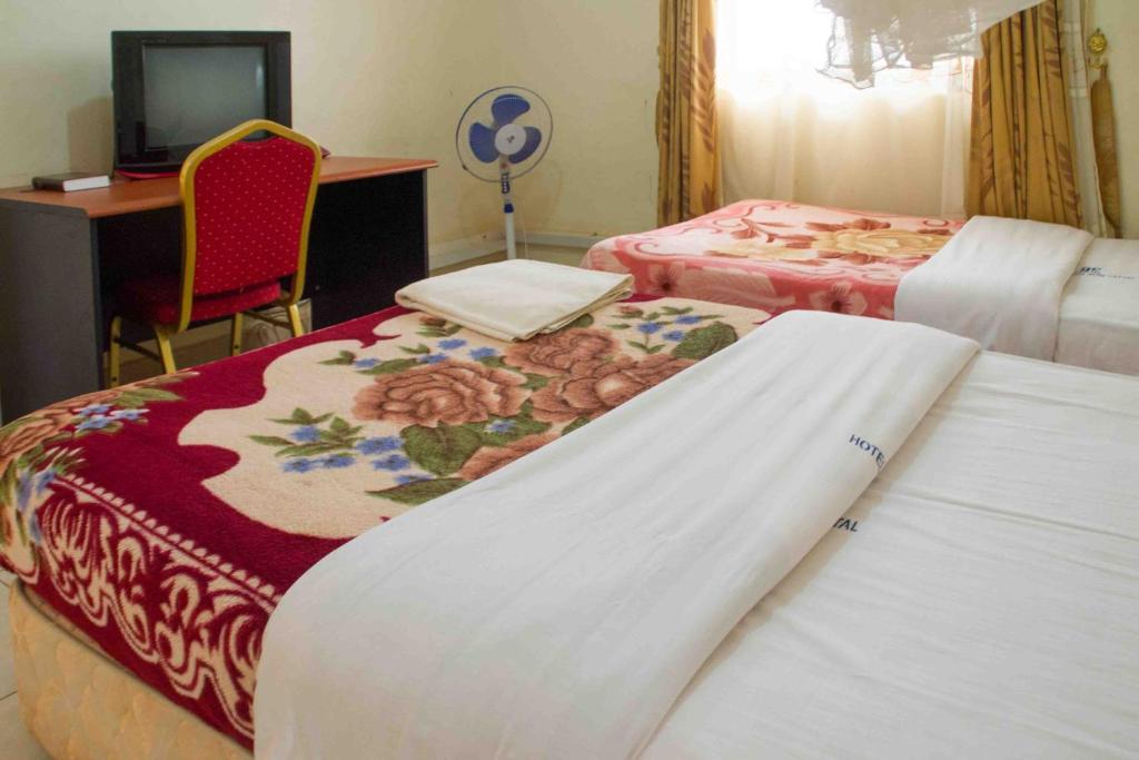 Standard Twin Bedroom Photo Hotel Nok Continental Gulu Uganda Northern Region 1