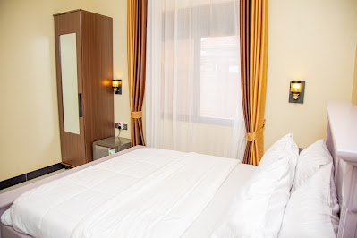 Double Bedroom with Balcony Photo Blanket Suites Kampala Uganda Central Region