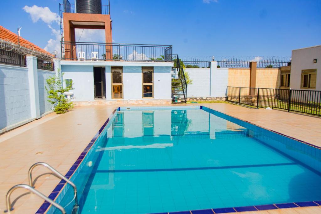 Outdoor swimming pool Photo Blanket Suites Kampala Uganda Central Region 1