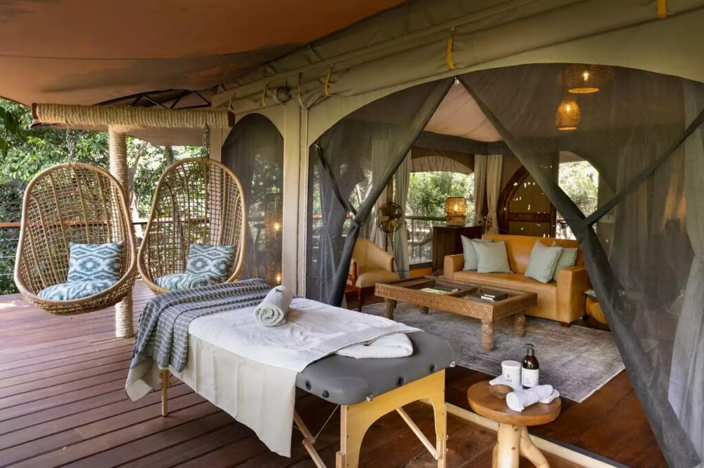 Photograph of a spa treatment table set up on an outdoor terrace