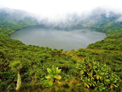 Photograph of a crater lake taken during a hiking tour in Volcanoes National Park in Rwanda.