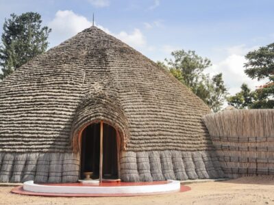 Photograph of the exterior of the King's Palace taken during a cultural tour in Rwanda's Cultural Heritage Corridor in Rwanda