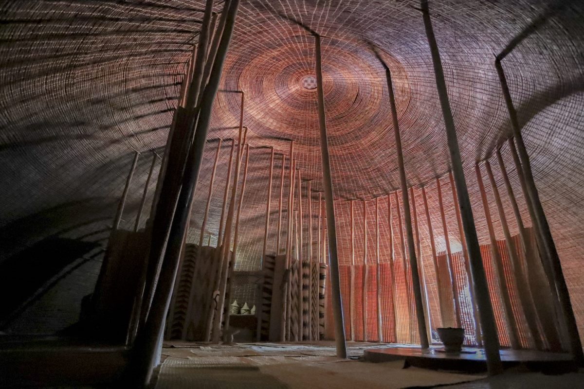 Photograph of the interior of the King's Palace taken during a cultural tour in Rwanda's Cultural Heritage Corridor in Rwanda