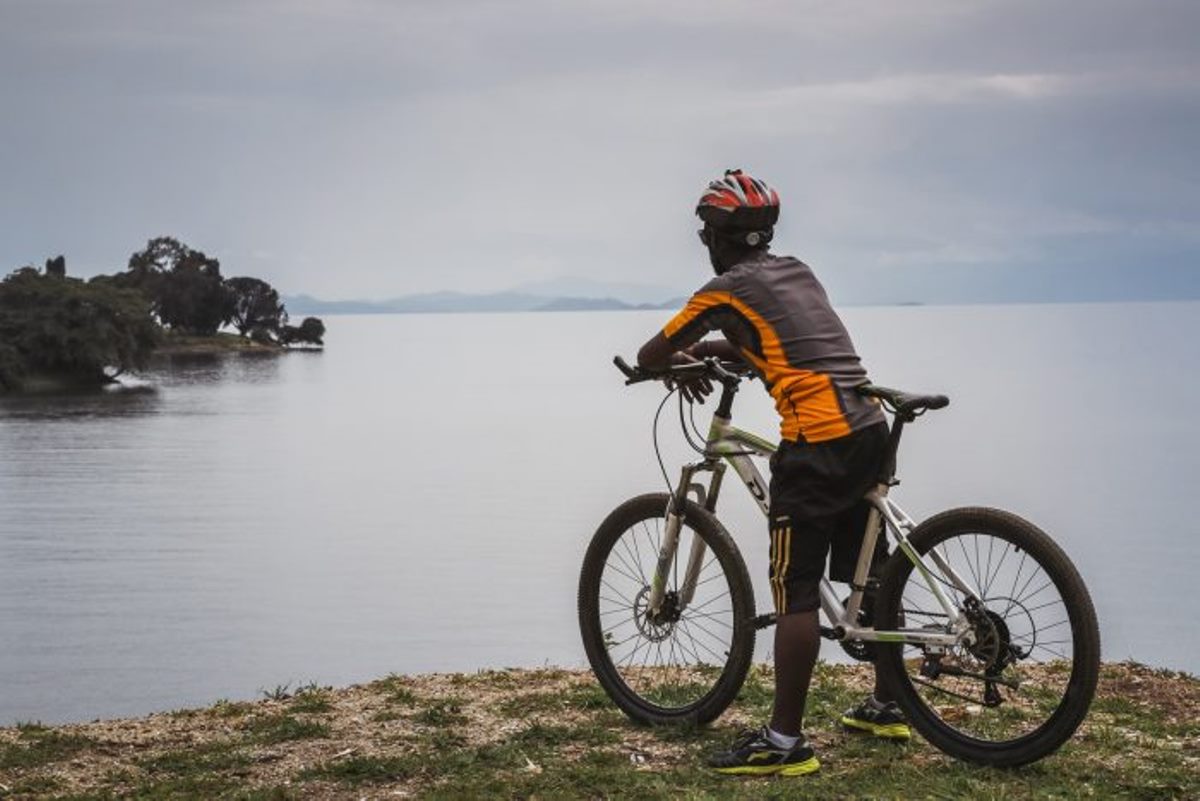 Photograph of a tourist taken during a biking tour around Lake Kivu in Rwanda