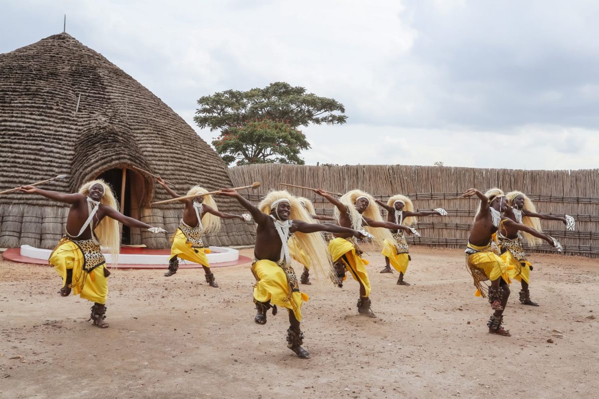 Photograph of dancers displaying their traditional dance taken during a cultural tour in Rwanda's Cultural Heritage Corridor in Rwanda