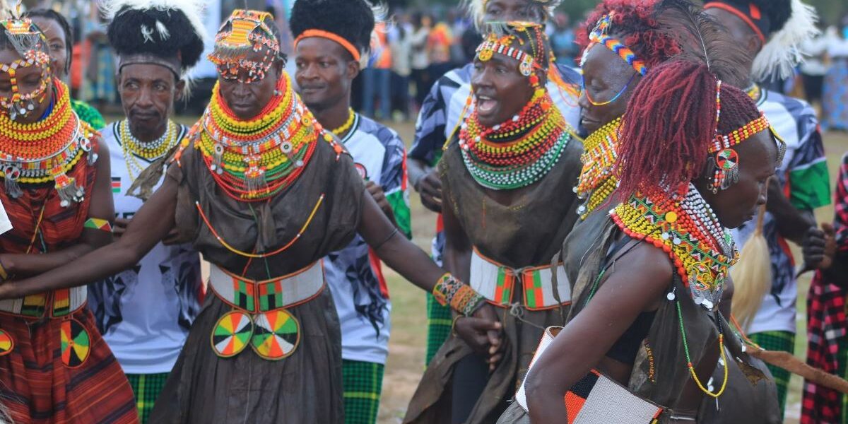 A photograph of some of the members of the Ateker Communities showcasing their traditional dance during the Ateker Reunion Festival in Soroti, Uganda.