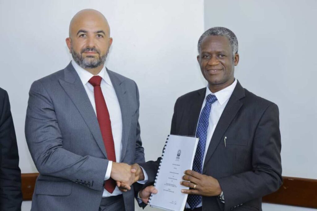 Photograph of Chairman UWA Board of Trustees, Prof. James Kalema, & the Managing Director of One Nature Hotels Limited, Eng. Hani Saliba taken after the signing of the contract