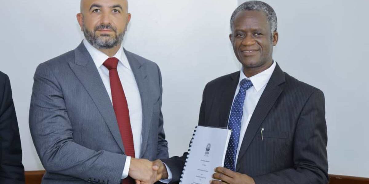 Photograph of Chairman UWA Board of Trustees, Prof. James Kalema, & the Managing Director of One Nature Hotels Limited, Eng. Hani Saliba taken after the signing of the contract