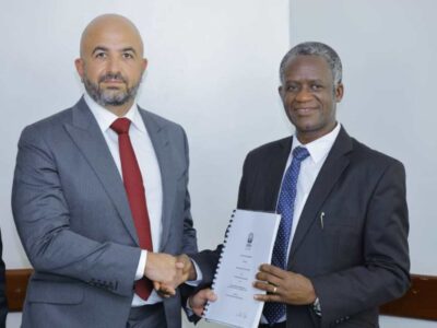 Photograph of Chairman UWA Board of Trustees, Prof. James Kalema, & the Managing Director of One Nature Hotels Limited, Eng. Hani Saliba taken after the signing of the contract