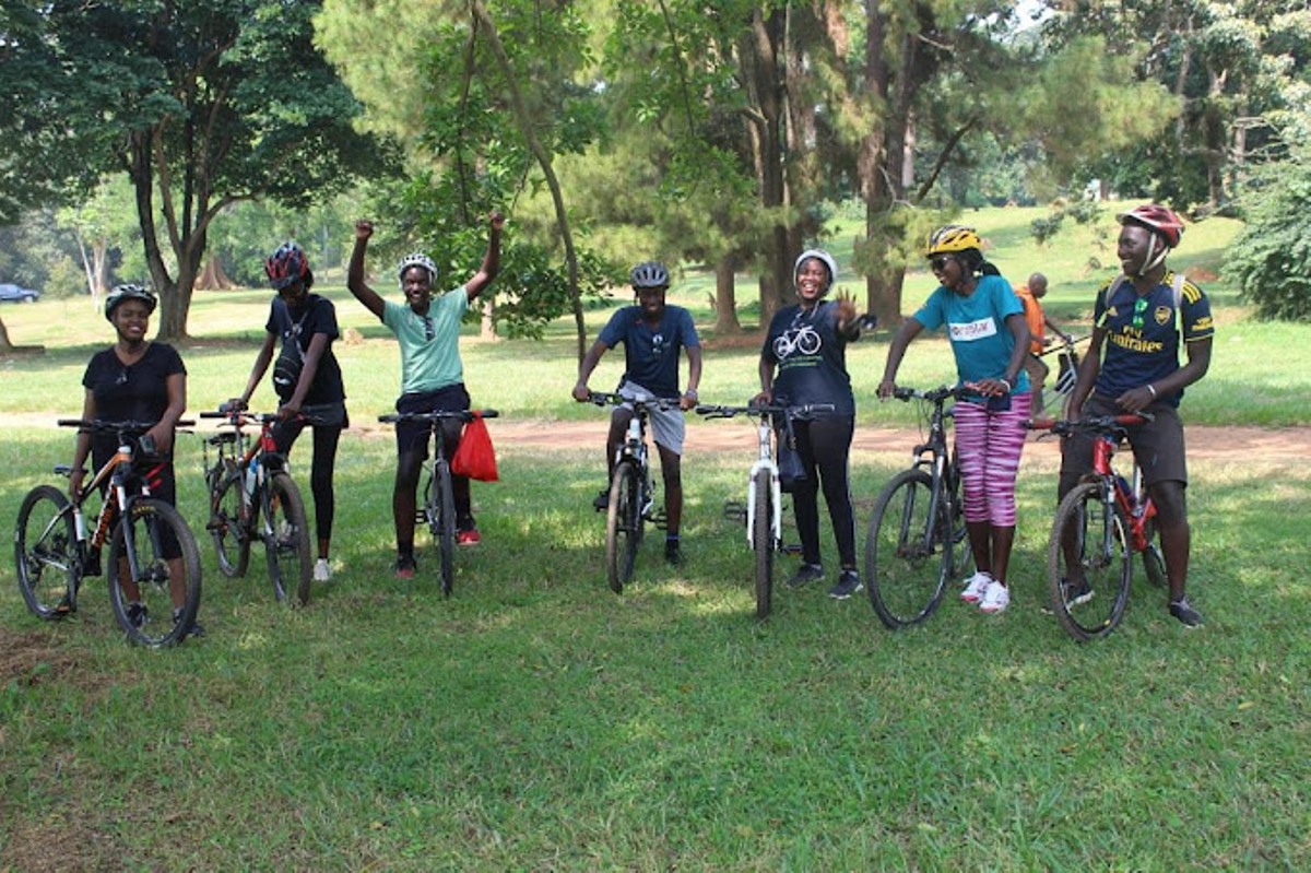 Photograph of cyclists taken during a biking tour in Entebbe, Uganda