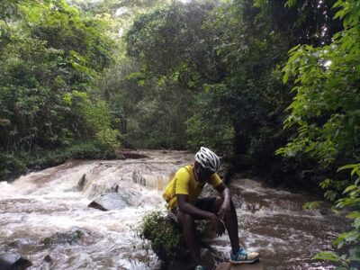 Photograph of a tourist taken during a tour to the Griffin Falls Camp in Mabira Forest in Lugazi, Uganda