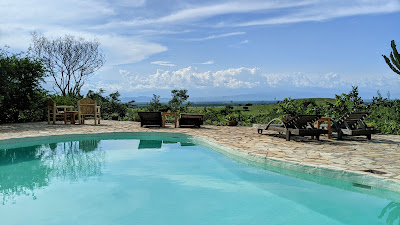 Outdoor swimming pool Photo Volcanoes Safaris Kyambura Gorge Lodge Queen Elizabeth National Park Uganda Western Region 1