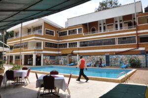 Property Exterior with pool view Photo Hotel International 2000 Kampala Central Region