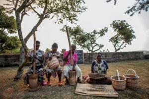 Photograph of some of the members of the Kyambura Women's Coffee Cooperative taken during a community tour in Kyambura in Western Uganda