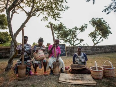 Photograph of some of the members of the Kyambura Women's Coffee Cooperative taken during a community tour in Kyambura in Western Uganda