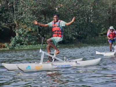 Photograph of a tourist on a water bike taken during a water biking adventure tour in Jinja, Eastern Uganda