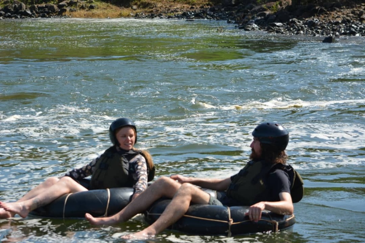 Photograph of tourists taken during a water tubing tour in Jinja, Eastern Uganda