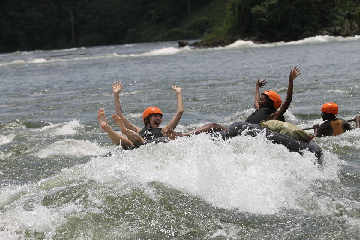 Photograph of tourists taken during a water tubing tour in Jinja, Eastern Uganda