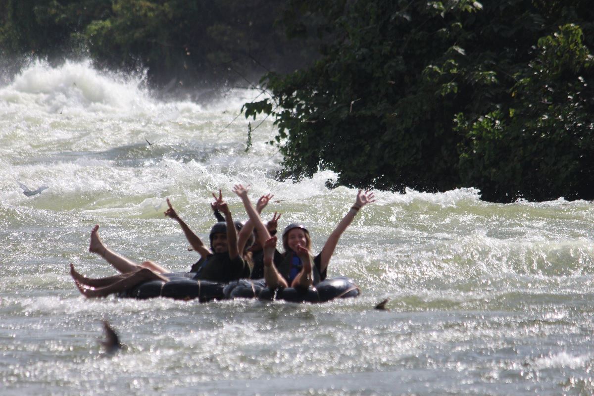 Photograph of tourists taken during a water tubing tour in Jinja, Eastern Uganda