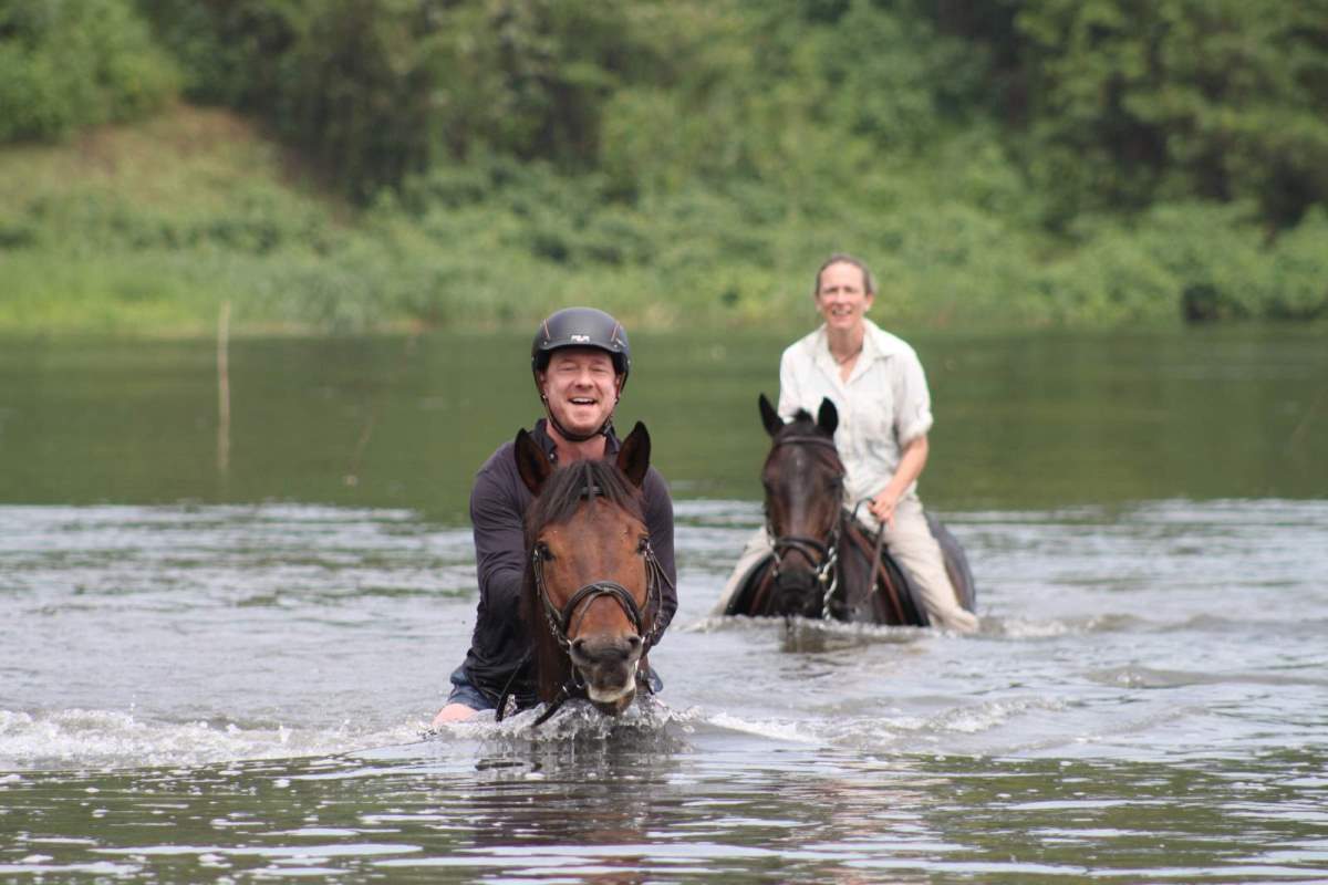 Photograph of tourists taken during a horseback riding tour in Jinja, Eastern Uganda