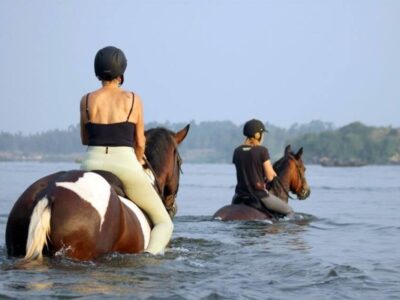 Photograph of tourists taken during a horseback riding tour in Jinja, Eastern Uganda