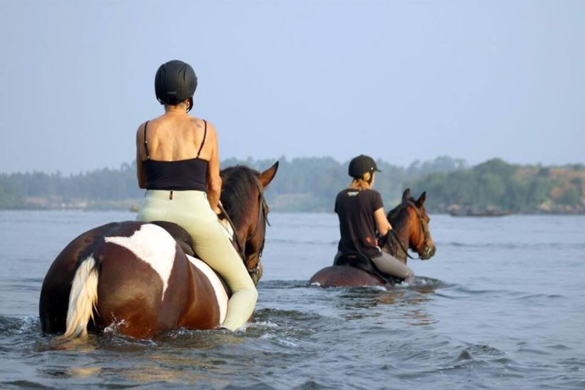 Photograph of tourists taken during a horseback riding tour in Jinja, Eastern Uganda