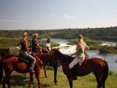 Photograph of tourists taken during a horseback riding tour in Jinja, Eastern Uganda