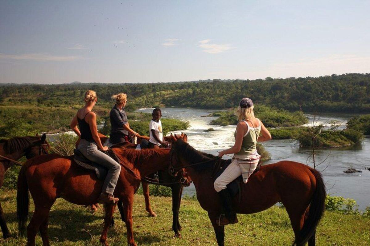 Photograph of tourists taken during a horseback riding tour in Jinja, Eastern Uganda