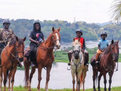 Photograph of a family taken during a horseback riding tour in Jinja, Eastern Uganda