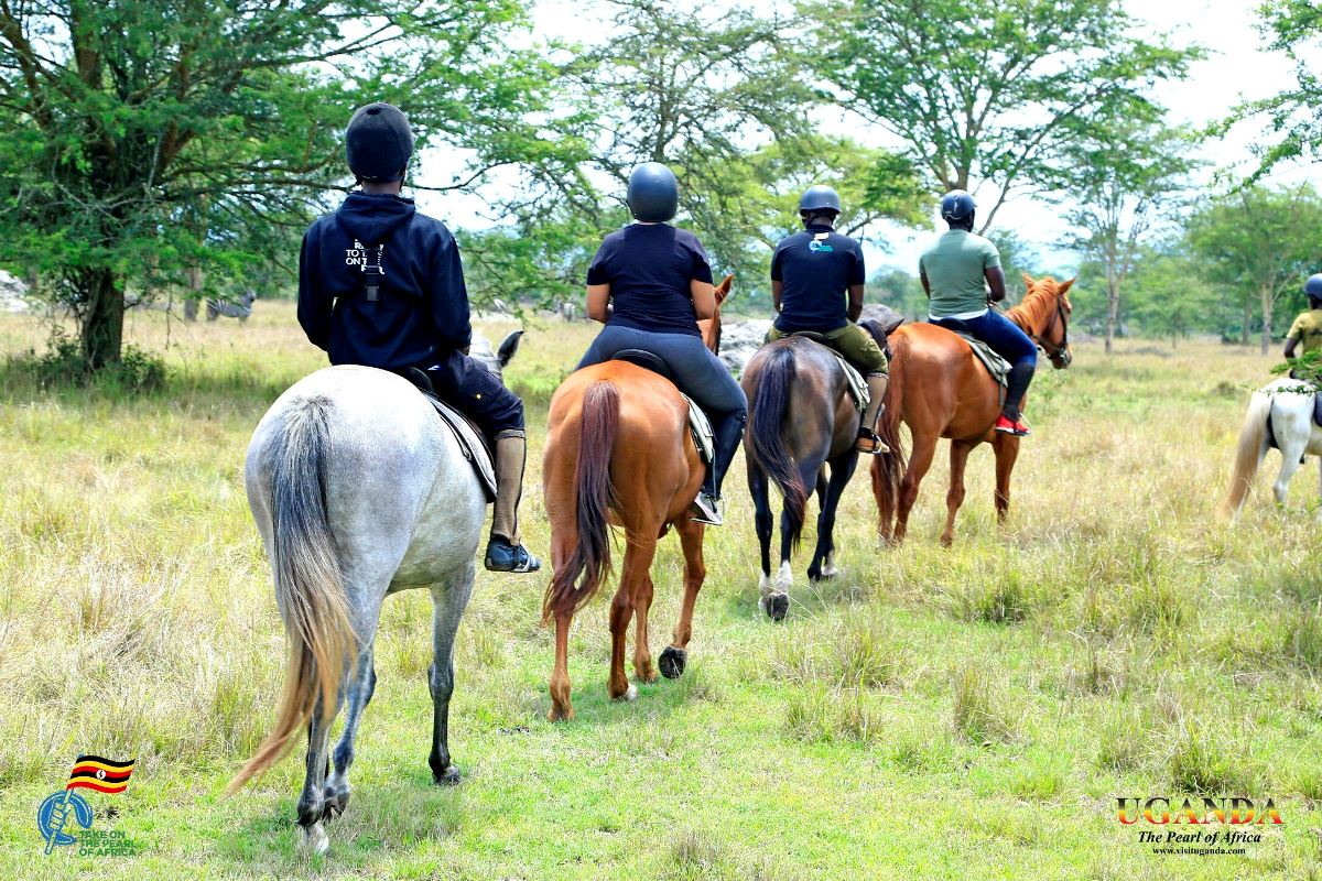 Photograph of tourists taken during a horseback riding tour in Jinja, Eastern Uganda