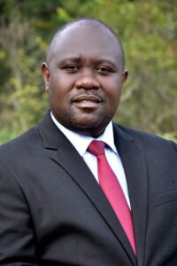 Photograph of Dr. James Musinguzi the newly appointed Executive Director of the Uganda Wildlife Authority (UWA)