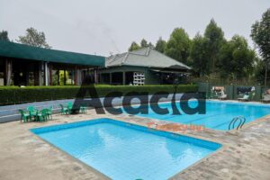 Outdoor swimming pool Photo Acacia Country Inn Mbarara Western Region