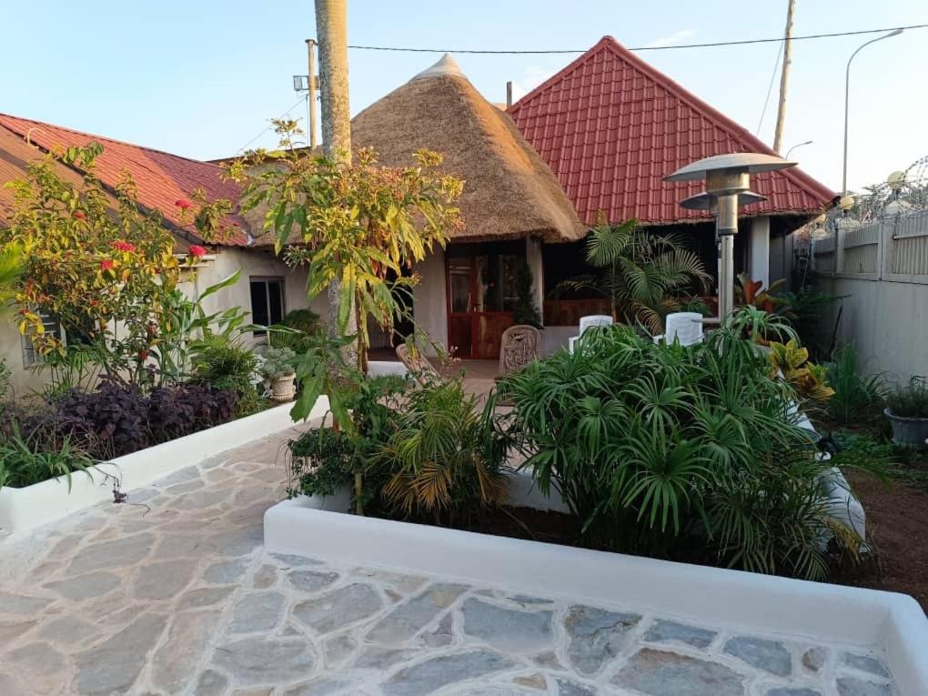 Property Exterior Photo Mia Safari Lodge Entebbe Central Region