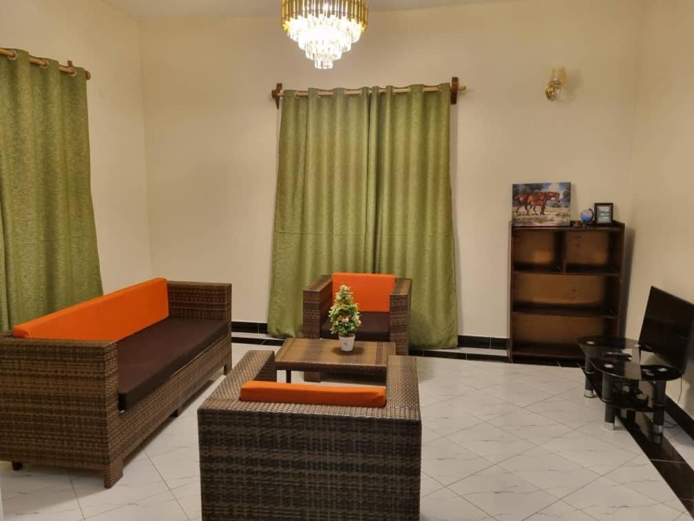 Living area Photo The Green-village Villa Entebbe Central Region