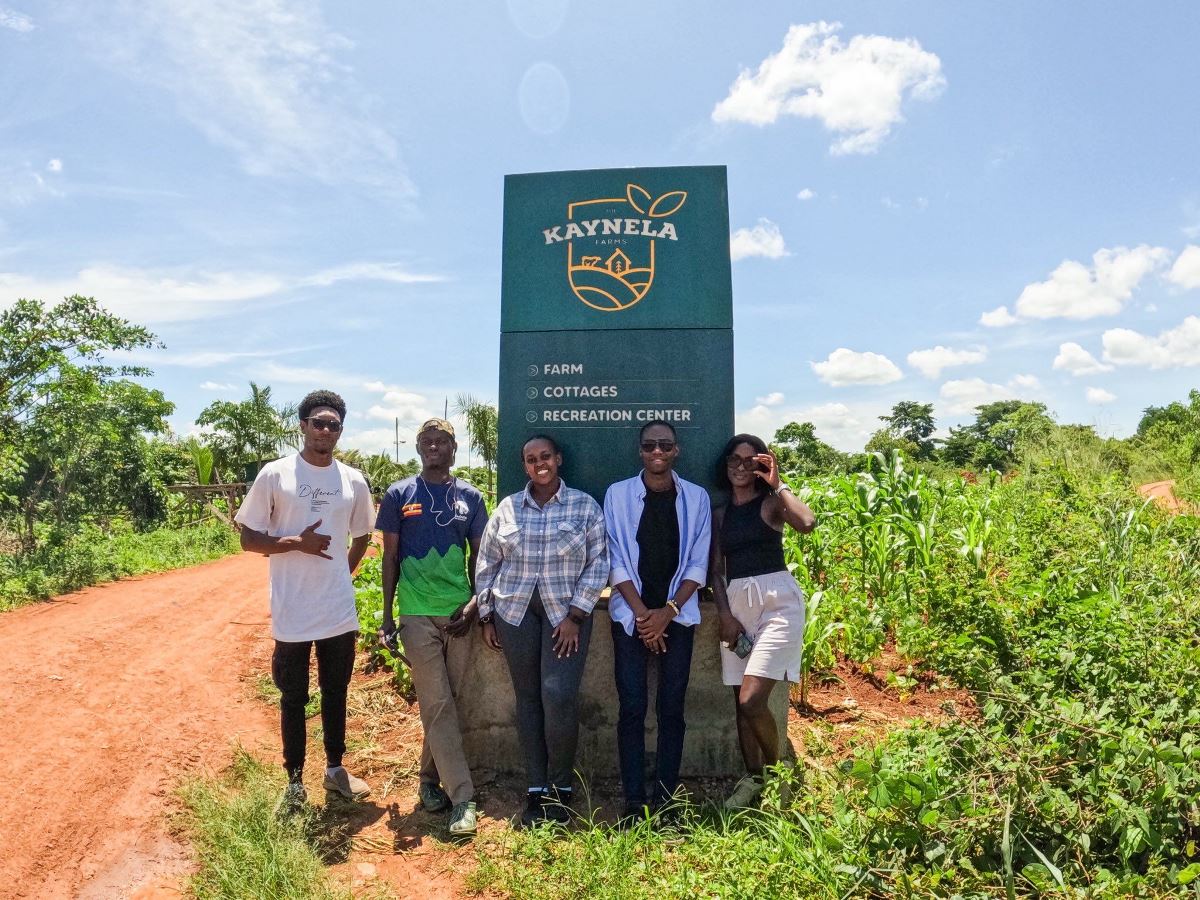 Photograph of tourists taken during a farm tour at Kaynela Farms in Kayunga, Uganda