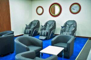 Photograph showing massage chairs and sofas taken from the new Karibuni Business Lounge at Entebbe International Airport in Entebbe, Uganda