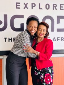 Photograph of Uganda Tourism Board (UTB) CEO Ms. Juliana Kagwa posing with Uganda Tourism Association (UTA) President, Mme Yewagnesh (Yogi) Biriggwa