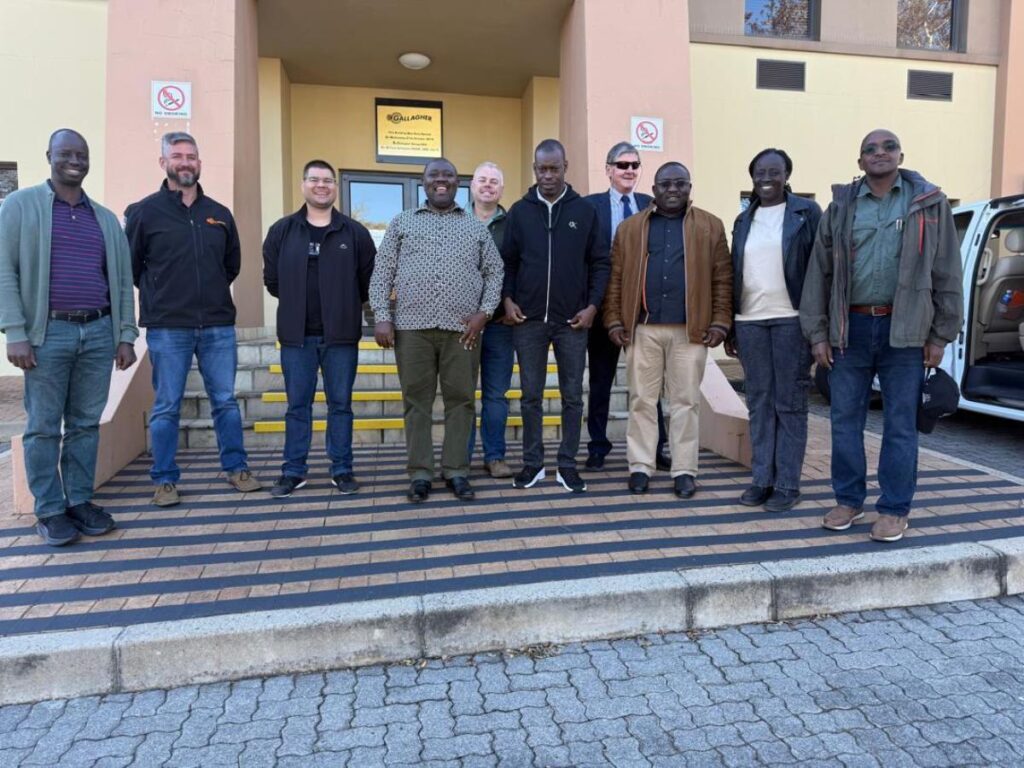 Photograph of Hon.Bahinduka Mugarra Martin and team taken during a bench marking trip to South Africa on best lion conservation strategies