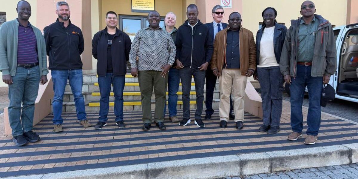 Photograph of Hon.Bahinduka Mugarra Martin and team taken during a bench marking trip to South Africa on best lion conservation strategies