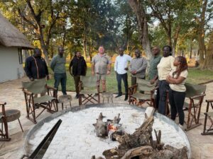 Photograph of Hon.Bahinduka Mugarra Martin and team taken during a bench marking trip to South Africa on best lion conservation strategies