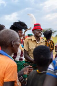 Photograph of the Karimajong people showing off their culture