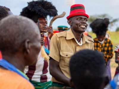 Photograph of the Karamojong people showing off their culture